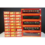 32 Boxed Hornby OO gauge items of rolling stock to include R4409 BR Hawksworth Passenger Brake