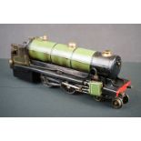 O gauge 4-4-0 steam locomotive painted in green, unmarked, showing some paint wear