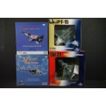 Four boxed 1/72 Witty Wings diecast models to include SU-27, F-15, Polish Air Force MiG-29UB & MI 17