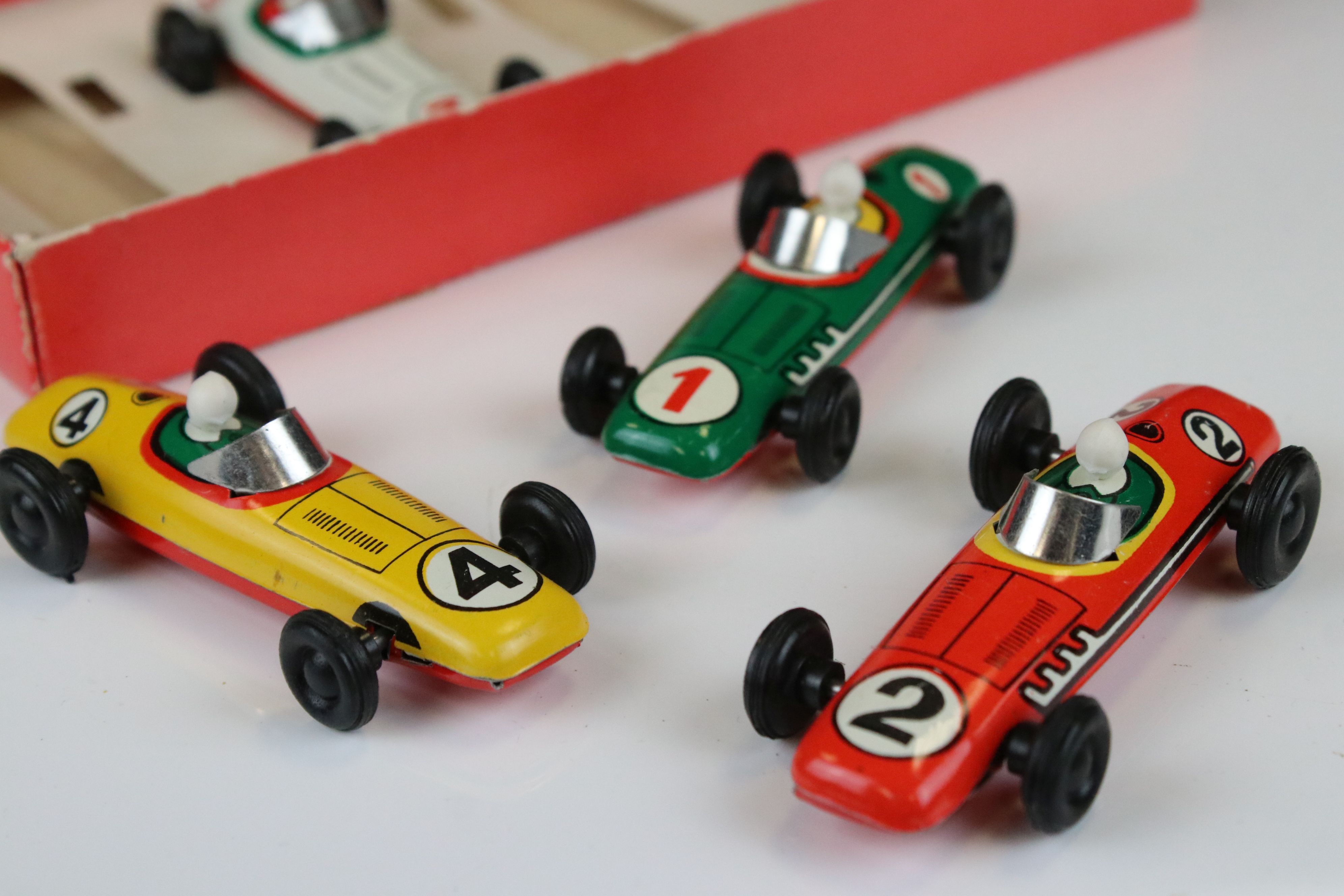 Boxed GDR made tin plate 5012 Grand Prix set of 4 x racing cars, features yellow, red, white & green - Image 3 of 11