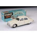 Boxed Corgi 208 Jaguar 2.4 Litre Saloon diecast model in white, showing some discolouring and