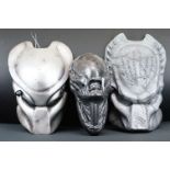 Three custom made wall hanging masks featuring 2 x Predator & 1 x Alien