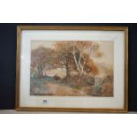 Late 19th / Early 20th century Watercolour of Figure with Horses on Country Lane, signed lower right
