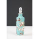Chinese ceramic scent bottle with enamel dragon decoration, with stopper, seal mark to base, 9.5cm