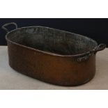 Antique Copper Oval Twin Handled Cooking Pot, stamped 55 with an arrow to side, 70cm long x 22cm