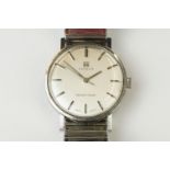Gents Tissot Seastar Seven stainless steel watch with silvered dial, baton hour markers, and a