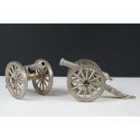 Pair of white metal field cannons