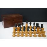 Early 20th century carved boxwood and ebony weighted chess set in the style of Staunton,