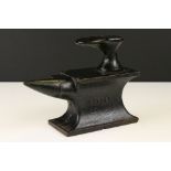 Cast Iron Miniature Cobbler's Anvil by Harper and number 4006 with an attached shoe last, 22cm long