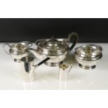 A silver plated Harrods tea set to include tea pot, sugar bowl and cream jug together with an Asprey