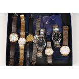 A collection of eight gents wristwatches to include Bulova, Summit, Sekonda, Garrard and Regent