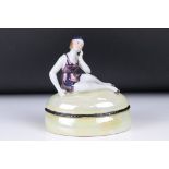 Art Deco style Ceramic Lustre Trinket Box, the lid surmounted by a lady in a bathing costume, 12.5cm