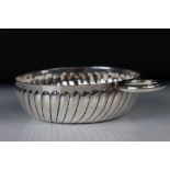 Silver Wine Taster, London, part fluted body, 1978 Israel Freeman & Son Ltd, 8cm diameter