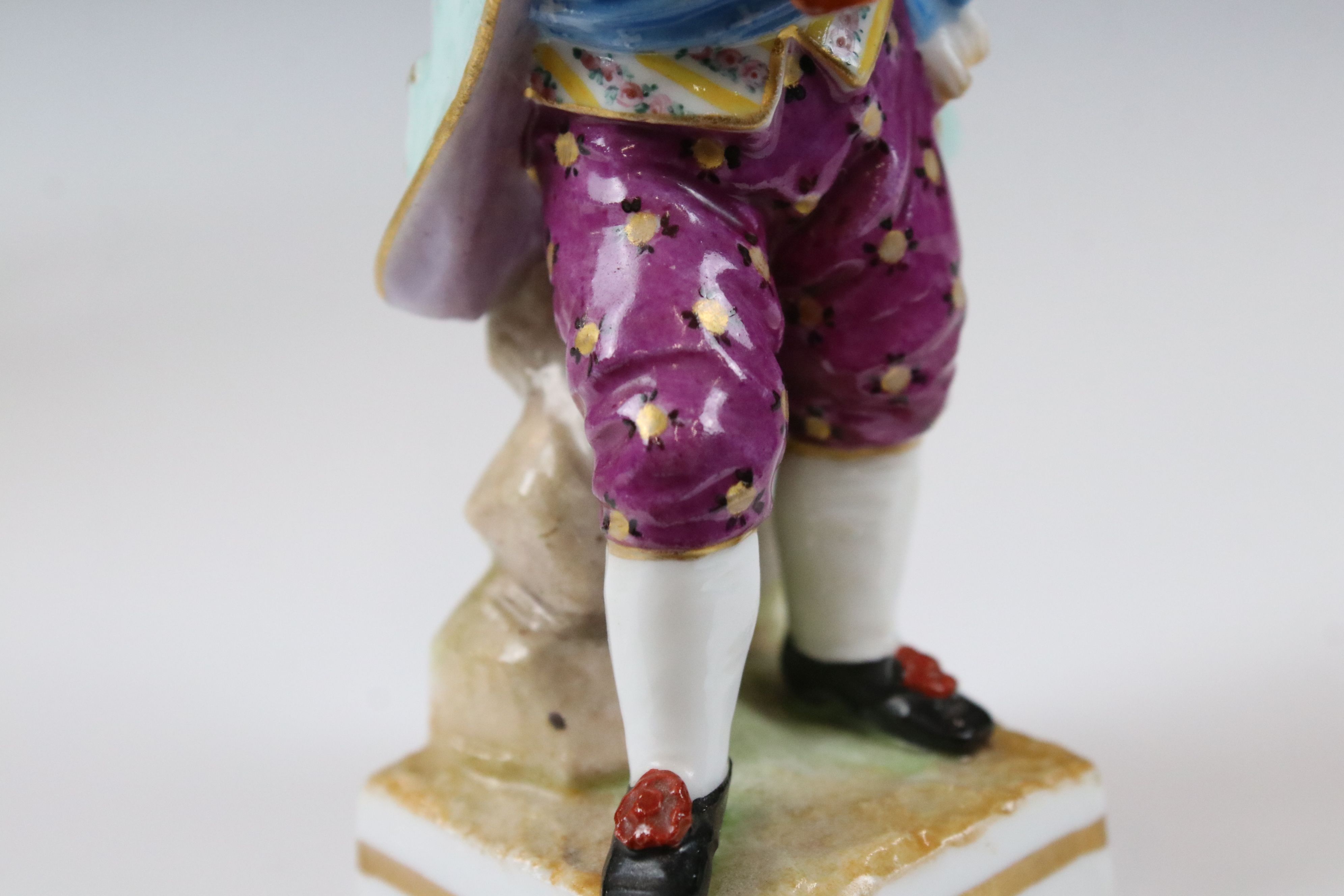Continental Porcelain Figure of a Boy playing a Musical Instrument, Meissen style blue cross - Image 11 of 11