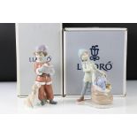 Two Lladro Figures including ' A Christmas Duet ' model 06714 and ' Sack of Dreams ' model 6894,