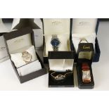 A collection of gents wristwatches to include three cased Rotary examples.