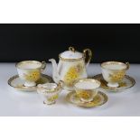 Shelley Tea for Two Set, gilt and yellow flower decoration, comprising Tea Pot, Two Tea Cups, Two