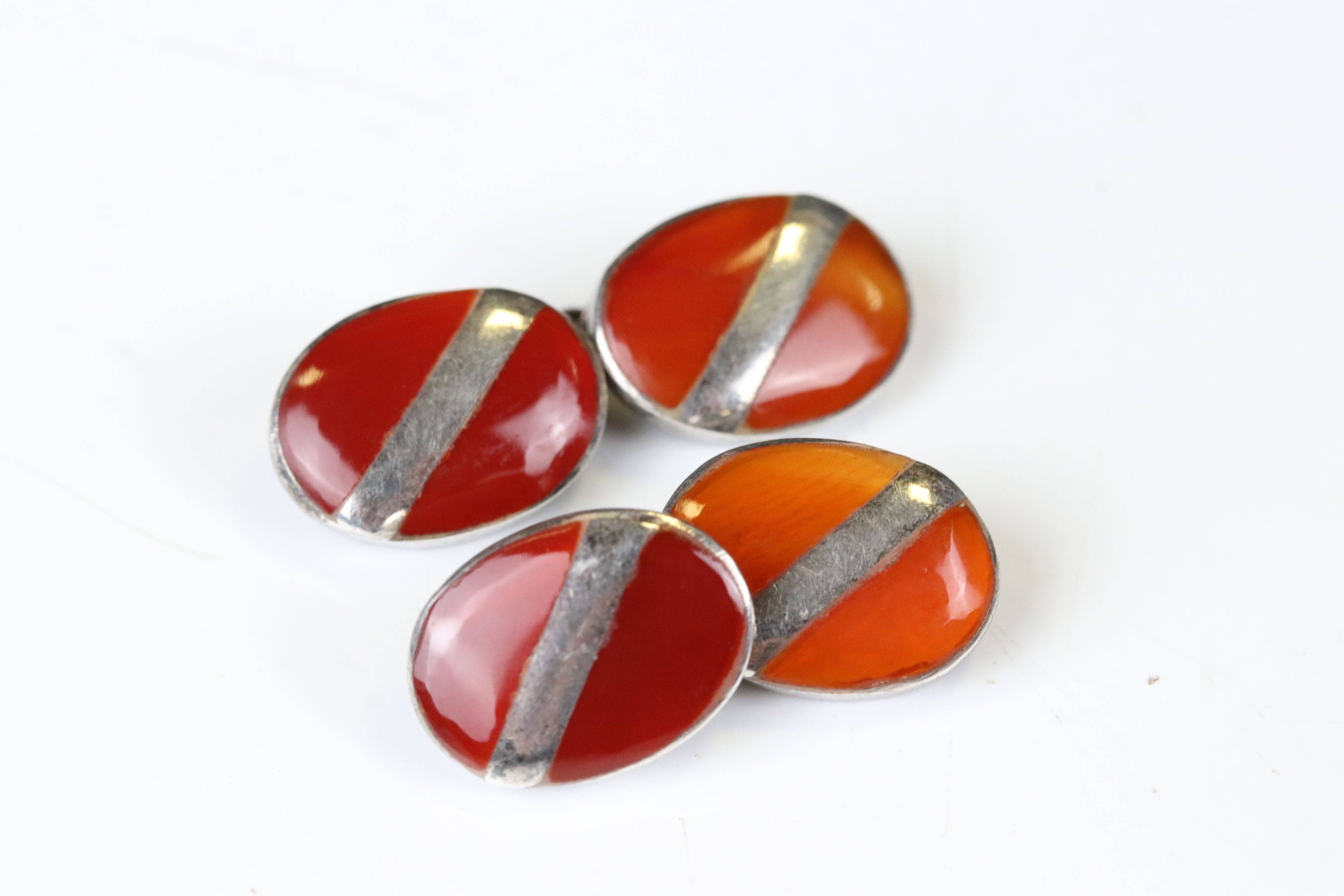 Pair of 1930's Silver and Polished Carnelian Double-sided Oval Cufflinks, stamped 925, each cufflink