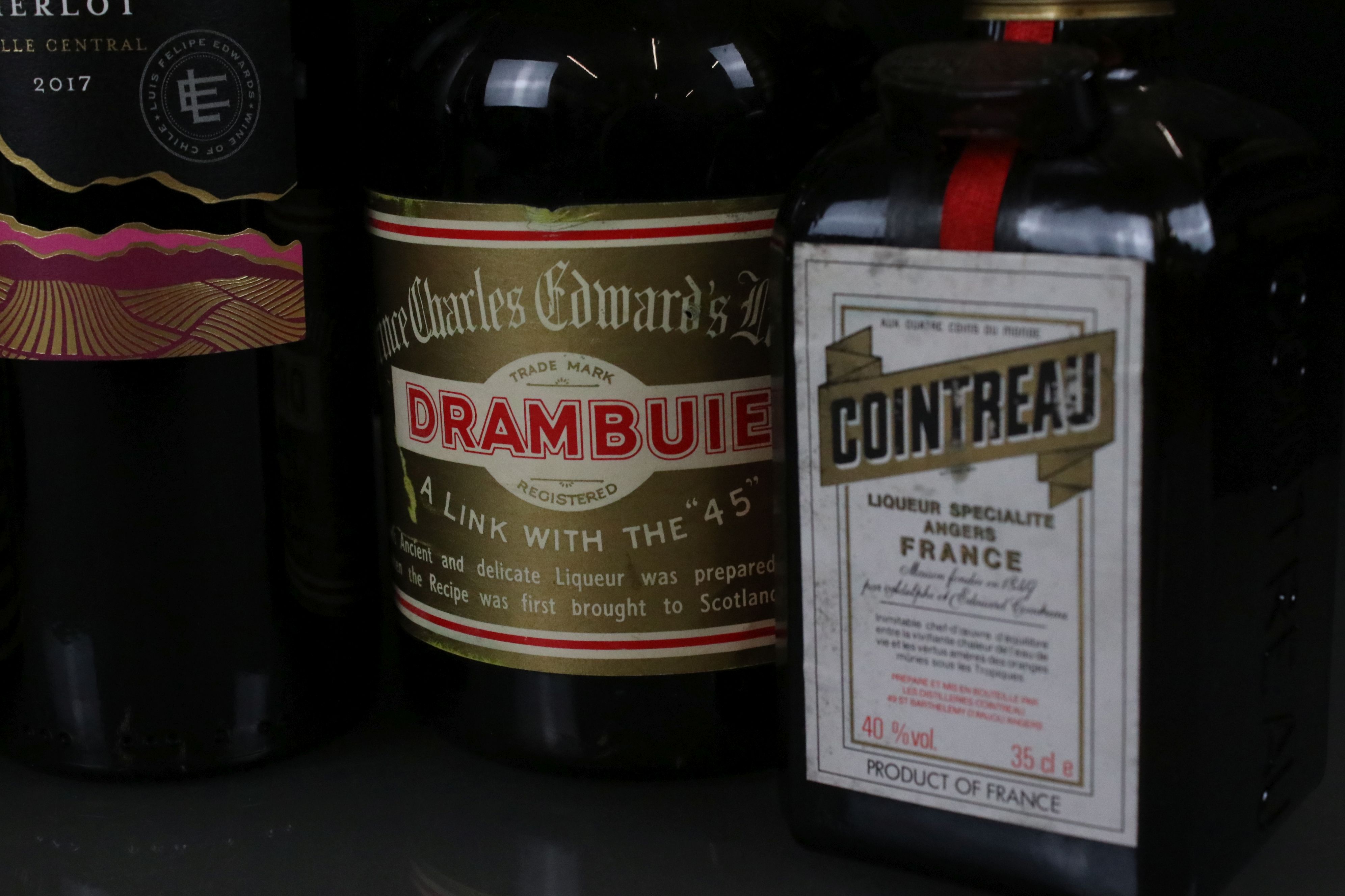 A collection of bottled spirits to include Drambuie, Cointreau, Tia Maria, Martel Cognac ...etc.. - Image 9 of 9
