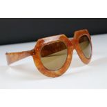 A pair of ladies mid 20th century sunglasses with bakelite frames.