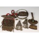 A small collection of ethnic purses and bags together with a large white metal choker necklace.