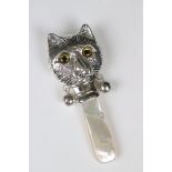 Silver Louis Wain style baby's rattle with mother-of-pearl handle