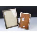 Two fully hallmarked sterling silver easel back photograph frames.