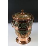 Copper Lidded Urn with engraved Persian / Zoroastrian type decoration, two ringed handled, 35cm high