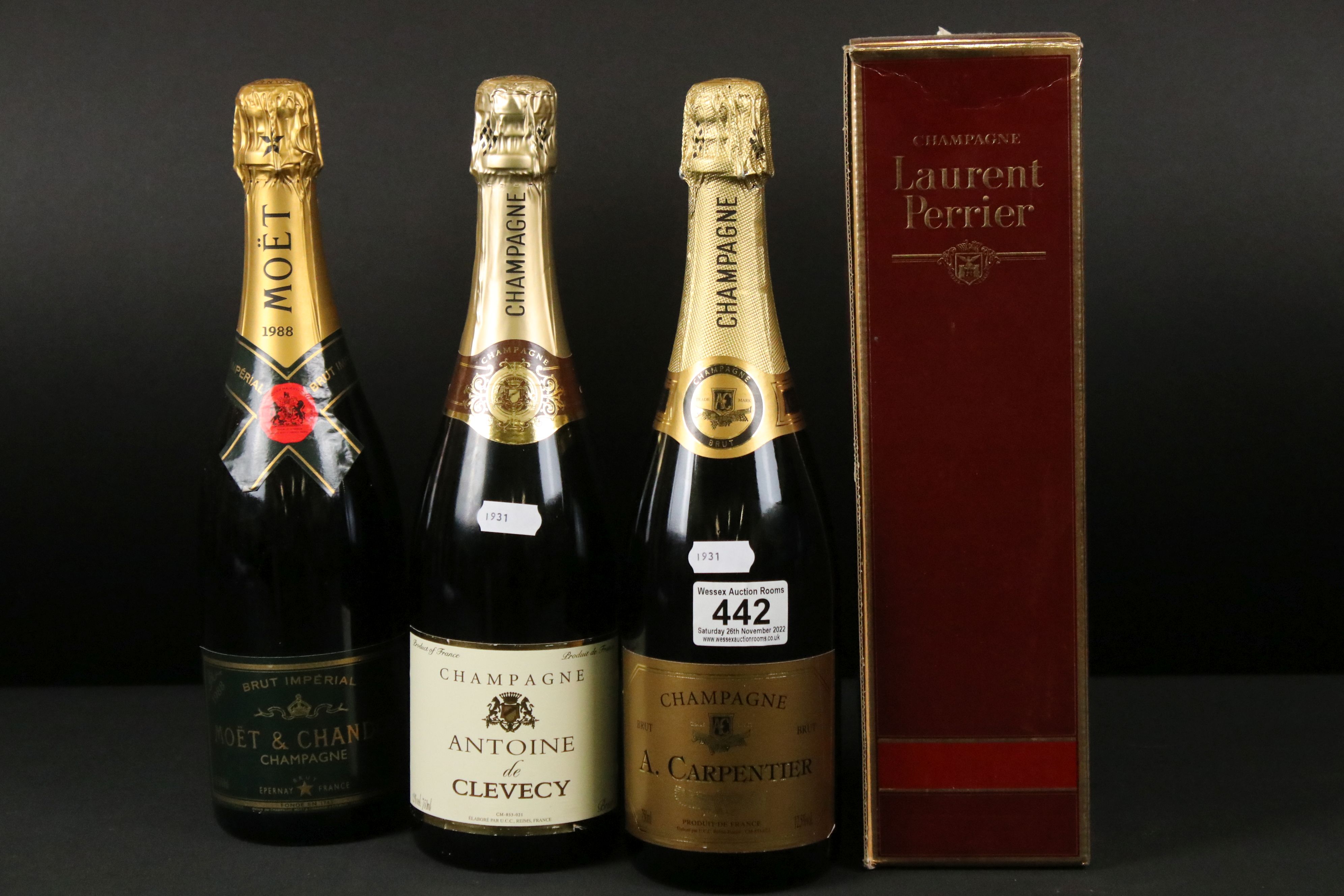 A collection of four bottles of Champagne to include A. Carpenter, Antoine De Clevecy, Moet &