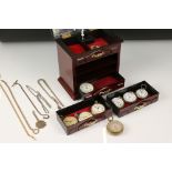 A collection of approx nine pocket watches together with Albert chains and a pocket barometer