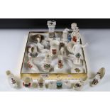 Twenty Two items of Crested Souvenir Ceramics including Policeman, Yorkshireman, Football, Banjo,