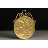 A George III full gold sovereign, date indistinct, heavily worn with mounting affixed to top.