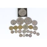 A small collection of mainly British pre decimal coins to include silver examples.