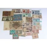 A small collection of banknotes to include Russian, German an World War Two examples.