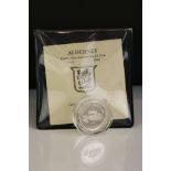 An Alderney silver proof coronation anniversary £1 coin complete with COA.