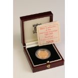 A British 1989 proof full gold sovereign coin (500th Anniversary) complete with COA and display