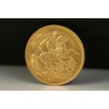 A British King Edward VII full gold sovereign coin, dated 1907.