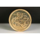 A British Queen Elizabeth II gold half sovereign coin, dated 2005.