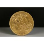 A British King George V gold half sovereign coin, dated 1913.
