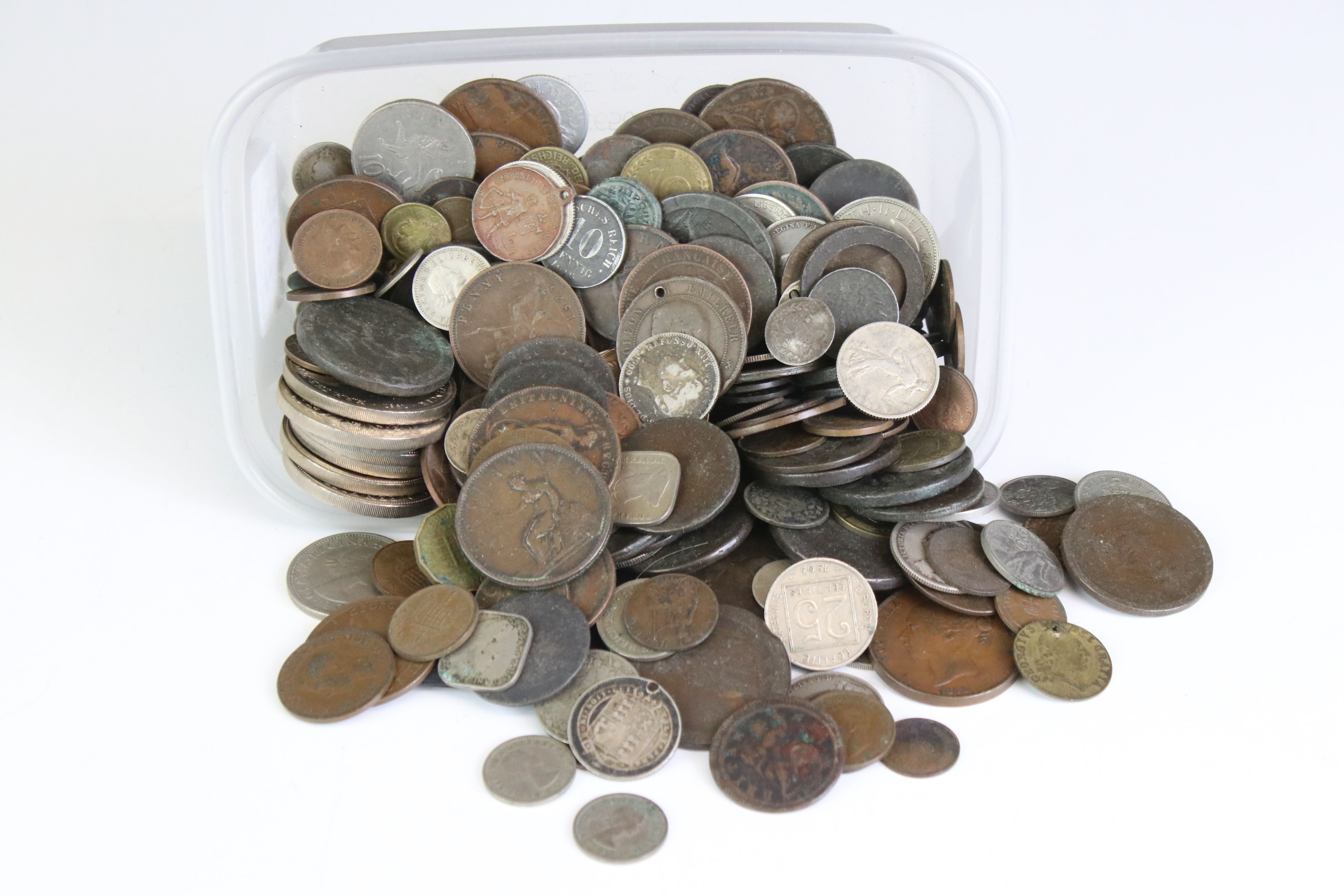 A mixed collection of mainly British pre decimal and foreign coins to include a good quantity of