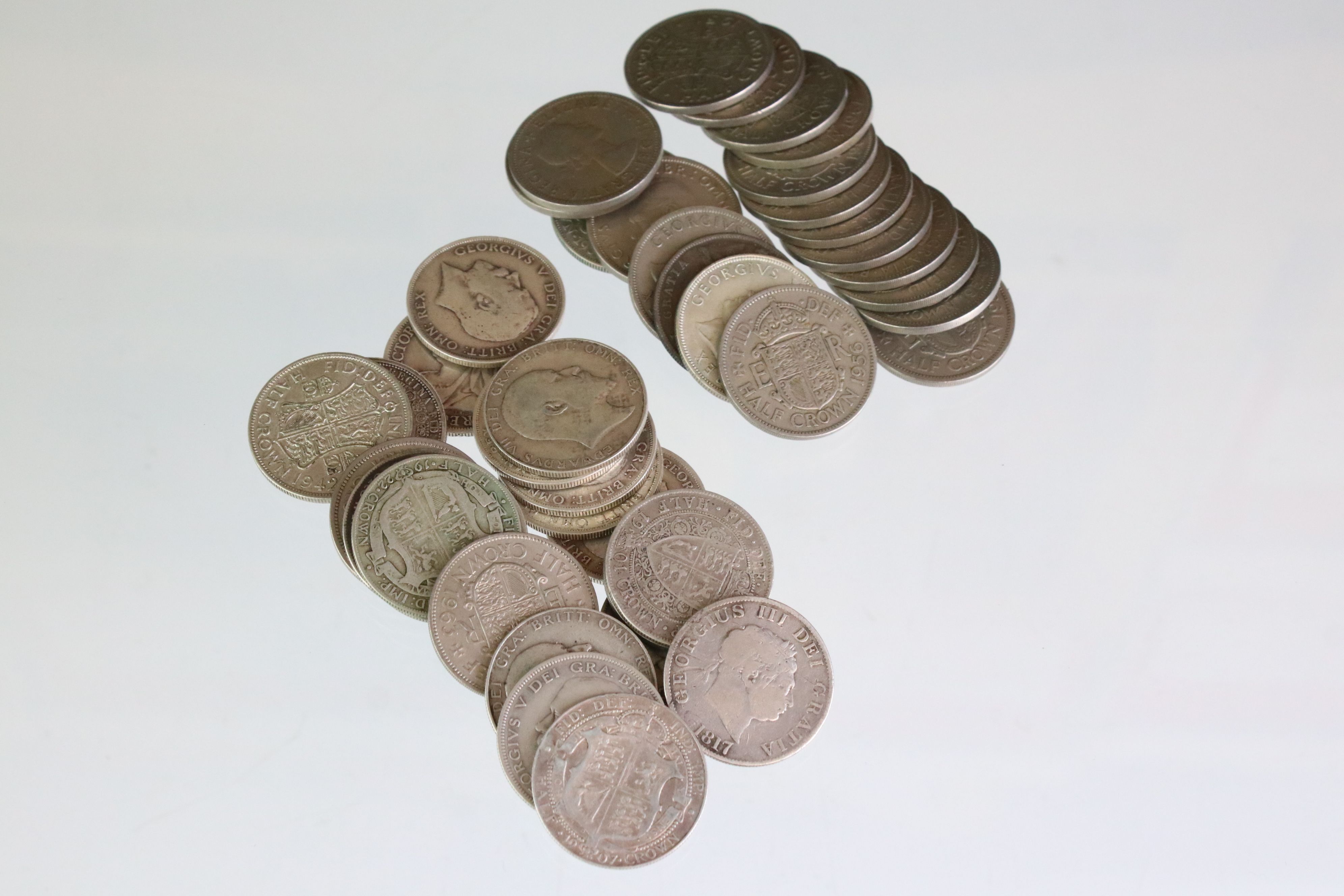 A collection of approx 40 British pre decimal half crown coin to include silver Queen Victoria and