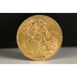 A British King George V 1913 gold full sovereign coin.