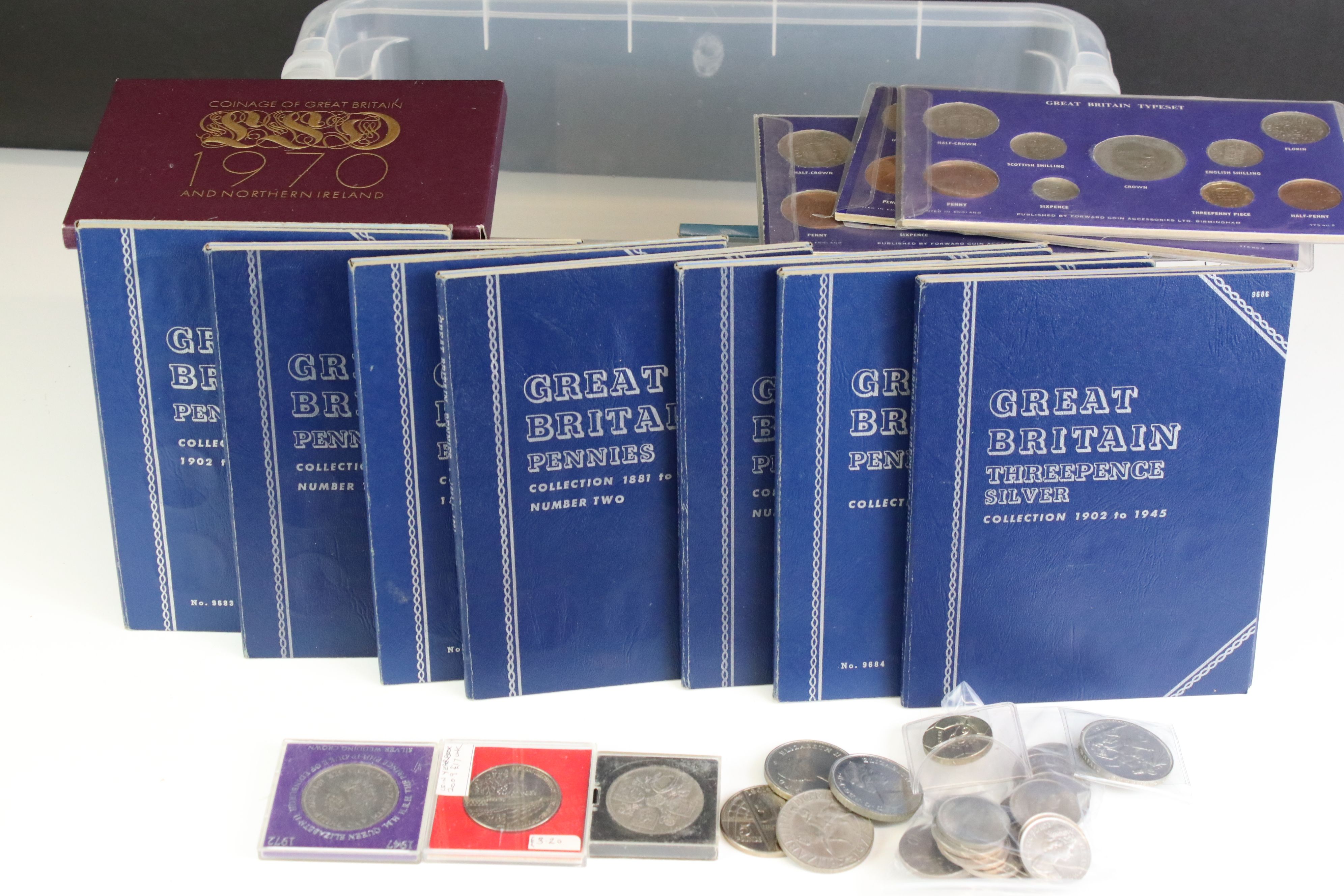 A large collection of British pre decimal coins contained within approx fourteen Whitworth folding