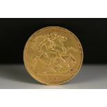 A British Queen Victoria gold half sovereign coin, dated 1894.
