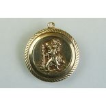 9ct yellow gold St Christopher pendant, diameter approx 2.5cm