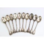 Ten Victorian silver teaspoons, the finials with cast foliate and berry decoration, repeating