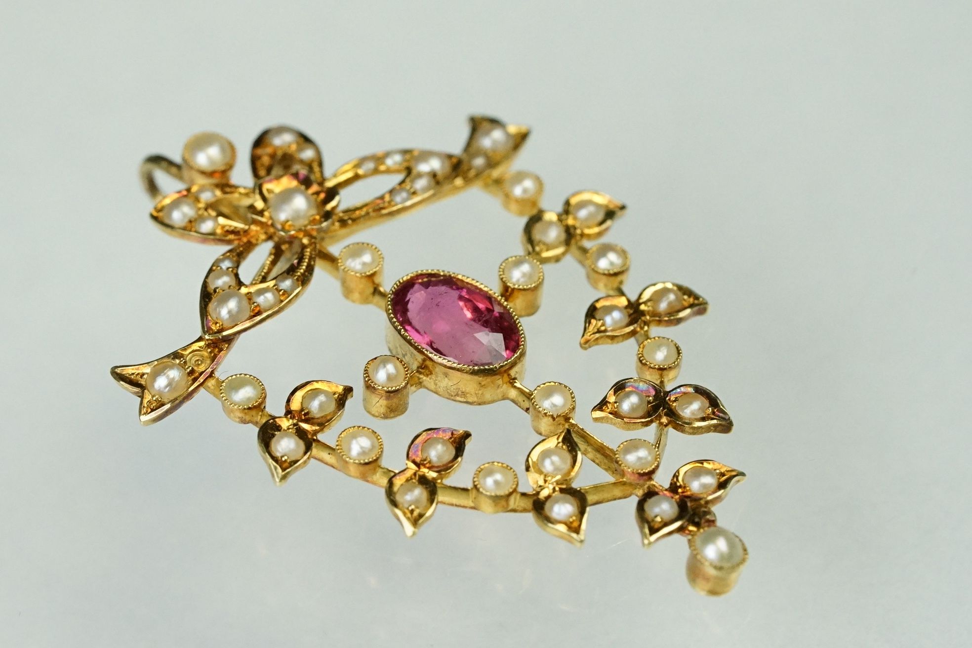 Edwardian tourmaline and seed pearl unmarked yellow gold pendant, the oval mixed cut pink tourmaline - Image 2 of 6