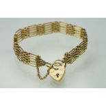 9ct yellow gold gate link bracelet with padlock clasp, width approx 10mm