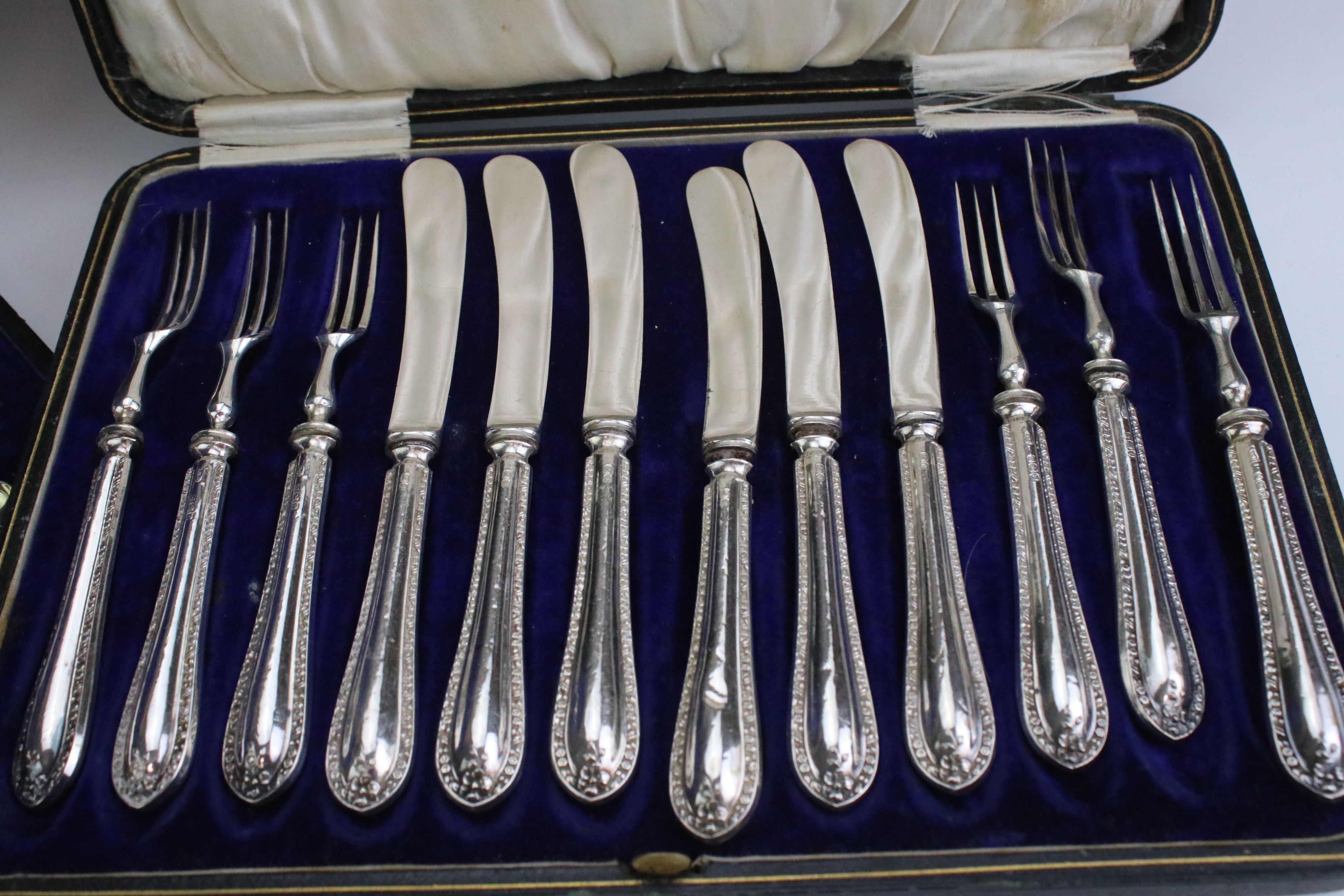 Set of silver fruit knives and forks, cast rose bud decoration to the handles, makers CW - Image 6 of 7