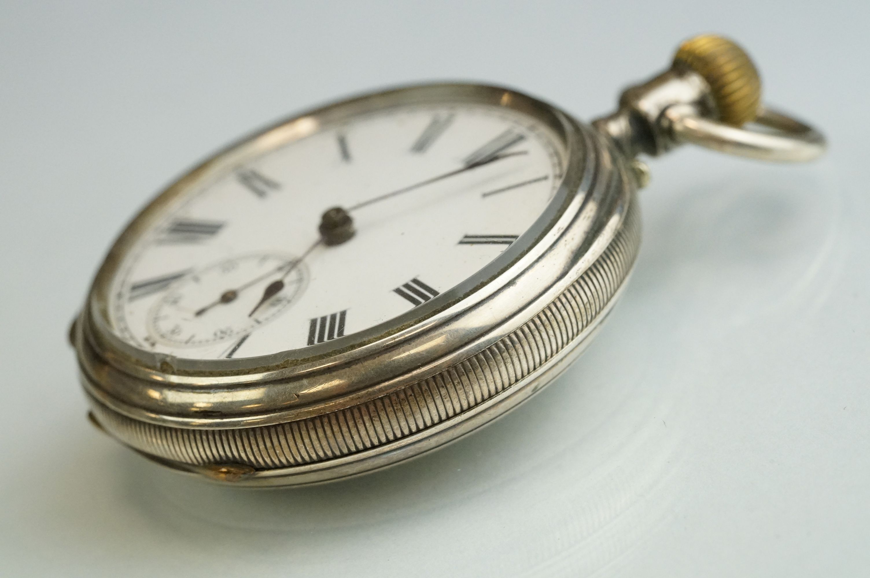 Silver open faced crown-wind pocket watch with black Roman numerals on a white enamel dial, - Image 3 of 8